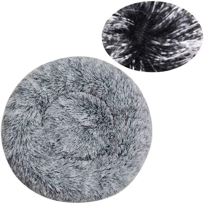 Soft and fluffy gray round calming pet bed for dogs, designed for ultimate comfort and relaxation.