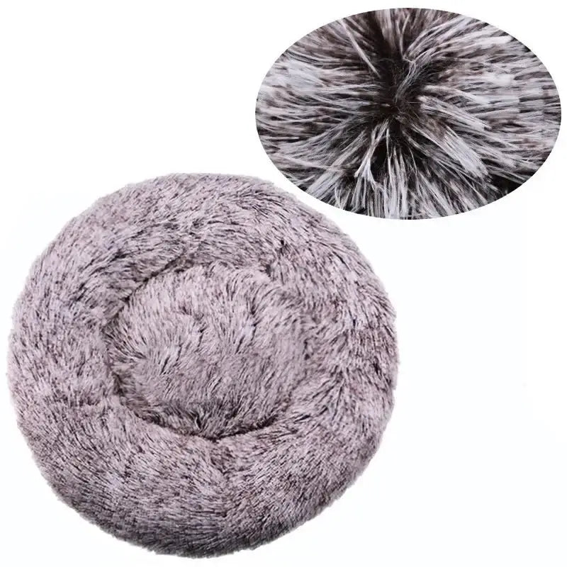 Fluffy calming pet bed in gray, featuring a soft plush design for comfort and security for pets.